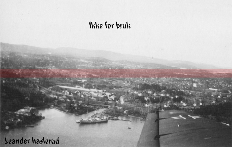 -3. Komp. I.R. 236-<br />Takk til &quot;Jan&quot; som kunne fortelle at dette var et luftfoto tatt over Lysaker (Lysakerelva er grensa mellom Oslo og Bærum i dag). <br />Og at bildet sannsynligvis er tatt fra et fly som er på vei til å lande på Fornebu flyplass.